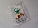Badge display with backing card and polythene bag.