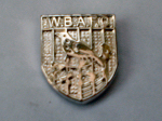 Die struck relief badge